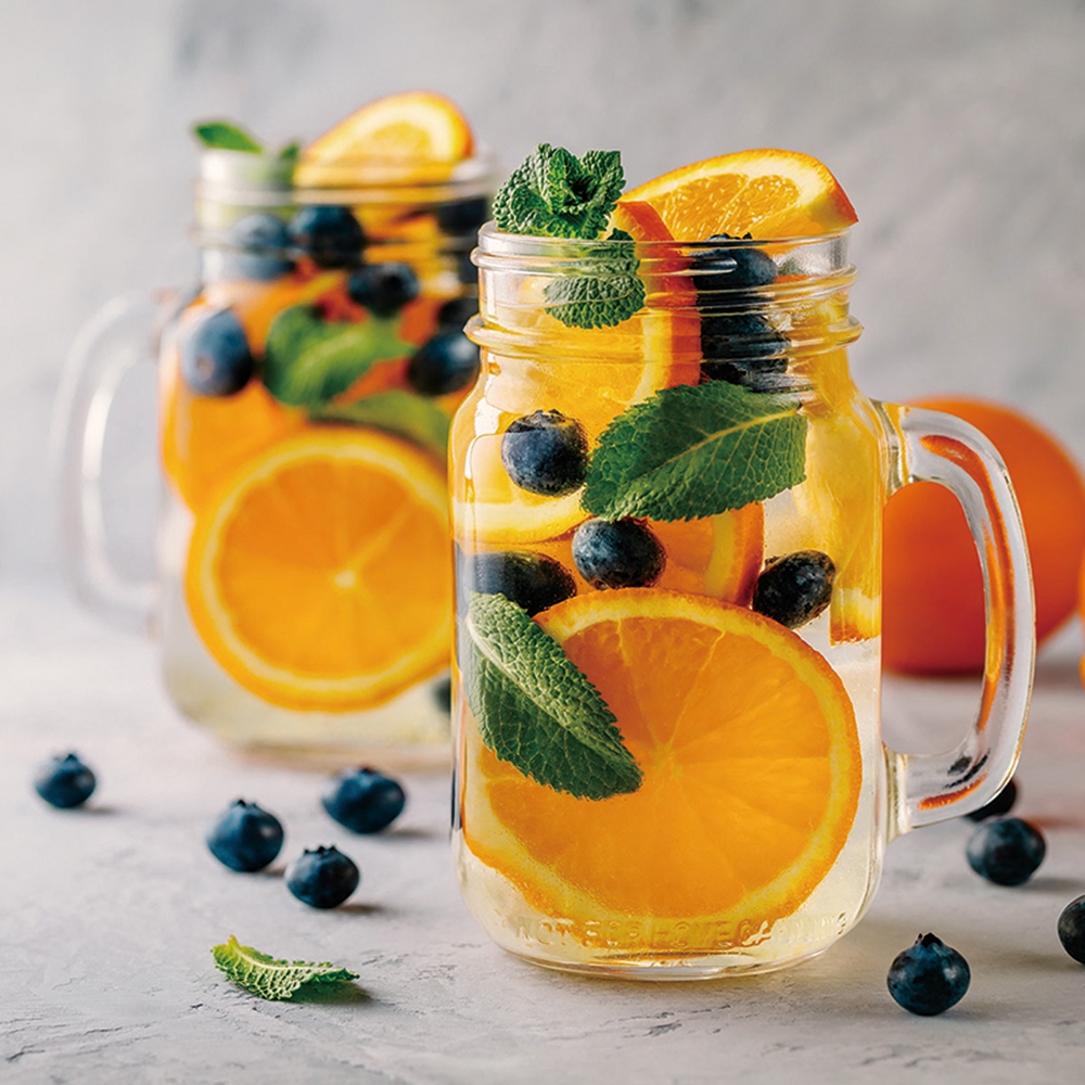 fruitwater sinaasappel op glas 60x60