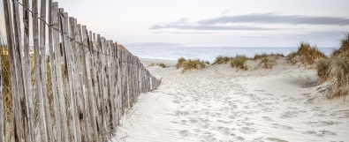 Fotokunst strand en duinen op glas 50x125