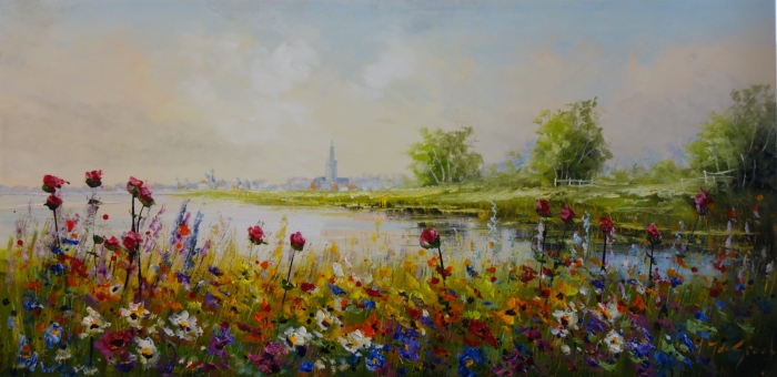 Kleurrijke bloemenweide met rozen, lelies en wilde bloemen aan een rustige waterkant met een stad op de achtergrond. Kleurrijke bloemenweide met rozen, lelies en wilde bloemen aan een rustige waterkant met een stad op de achtergrond.