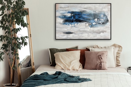 abstract schilderij boven bed